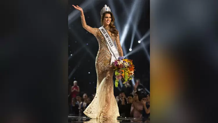 You are Miss Universe 2016,Iris Mittenaere from France.