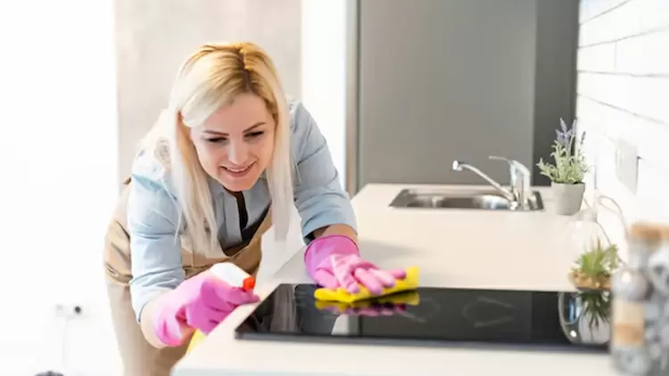 A housewife is cleaning. What do you think she's thinking at this moment?
