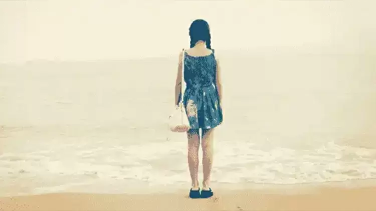 Estimate the height of the person in the picture.