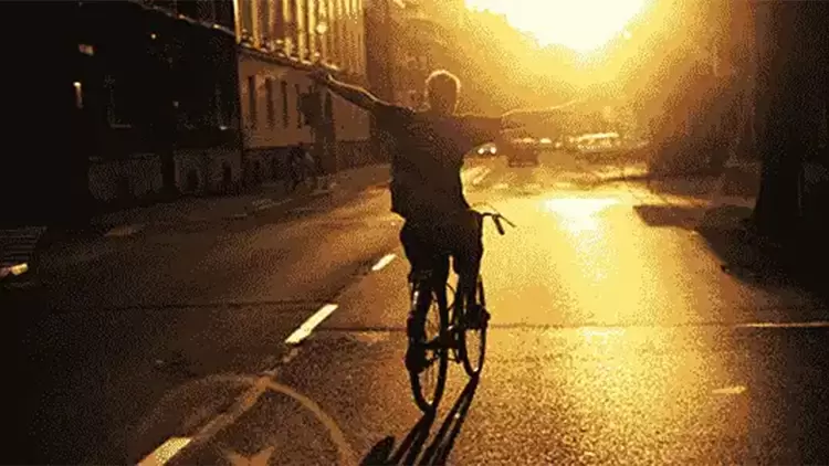 Estimate the height of the person in the picture.