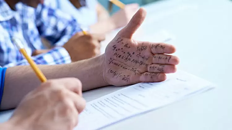 If you discover your classmate cheating on an exam, what would you do?  