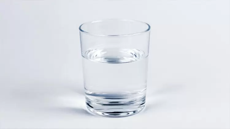 Half-filled cup of water